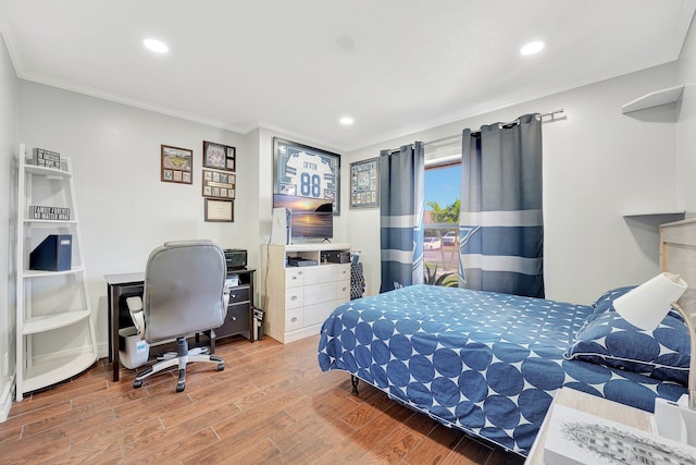 bedroom with crown molding and wood-type flooring