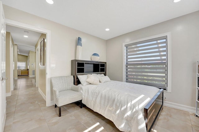 bedroom featuring light tile patterned floors