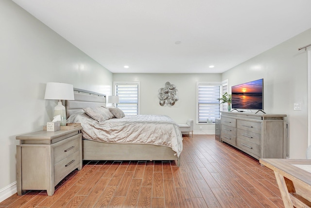 bedroom with wood-type flooring