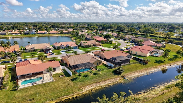 drone / aerial view featuring a water view