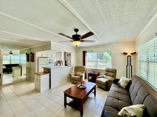 225 Westbury L 225, Deerfield Beach, FL 33442 - living area with light tile patterned floors, a ceiling fan, and ornamental molding