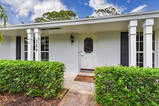 surrounding community with a lawn and a water view