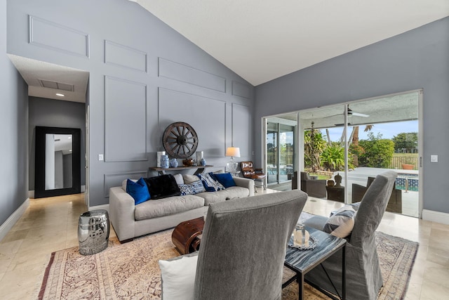 living room with high vaulted ceiling