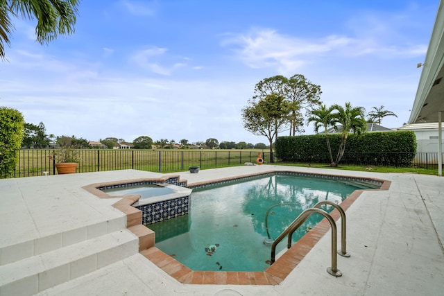 view of pool featuring an in ground hot tub and a patio area