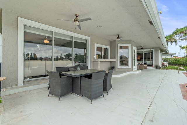 view of patio with ceiling fan