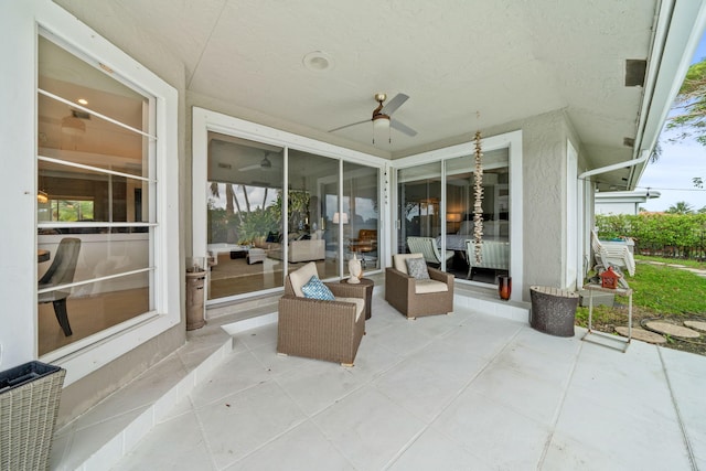 view of patio / terrace featuring ceiling fan