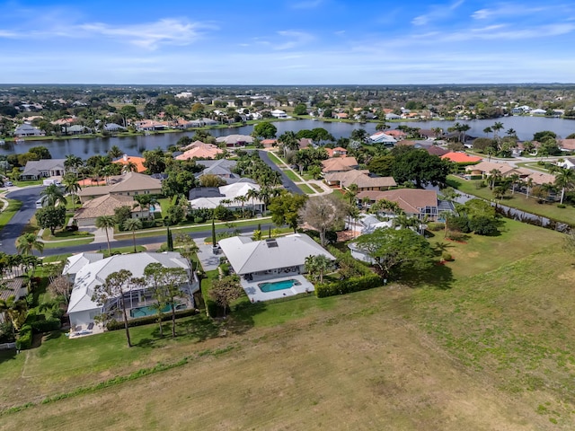 drone / aerial view with a water view