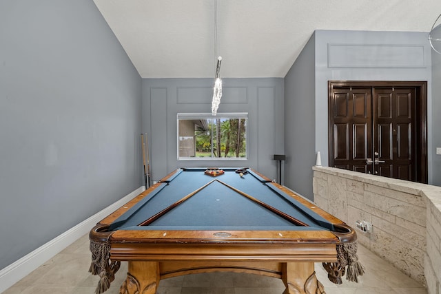 playroom with vaulted ceiling, billiards, and a textured ceiling