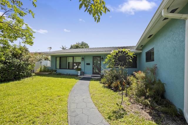 1821 N 50th Ave, Hollywood, FL 33021 - view of front of property with stucco siding and a front lawn