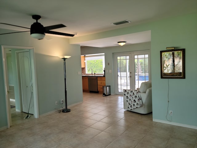 1821 N 50th Ave, Hollywood, FL 33021 - living area with french doors, ceiling fan, and baseboards