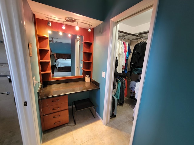 1821 N 50th Ave, Hollywood, FL 33021 - bathroom featuring a walk in closet and tile patterned flooring