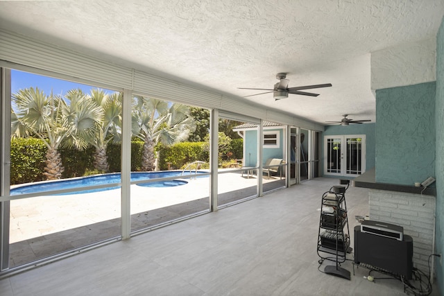 1821 N 50th Ave, Hollywood, FL 33021 - unfurnished sunroom with a ceiling fan and french doors