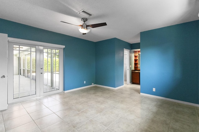 1821 N 50th Ave, Hollywood, FL 33021 - tiled empty room featuring ceiling fan, baseboards, and french doors
