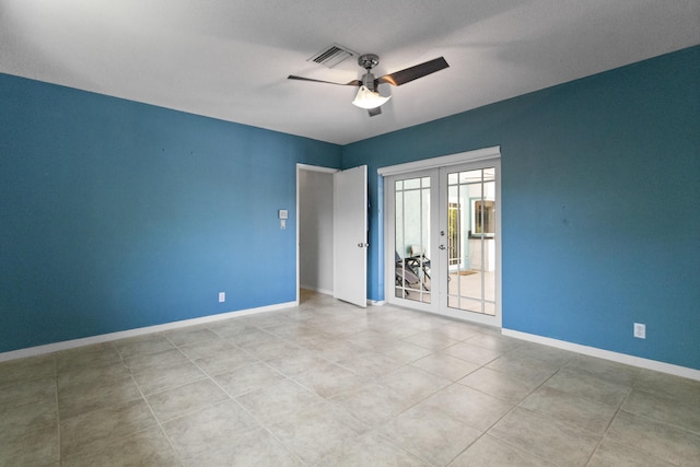 1821 N 50th Ave, Hollywood, FL 33021 - empty room featuring french doors, a ceiling fan, baseboards, and tile patterned flooring