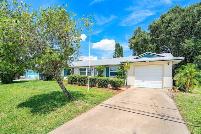 ranch-style house featuring a garage and a front yard