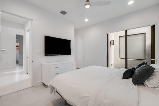 tiled bedroom with ceiling fan