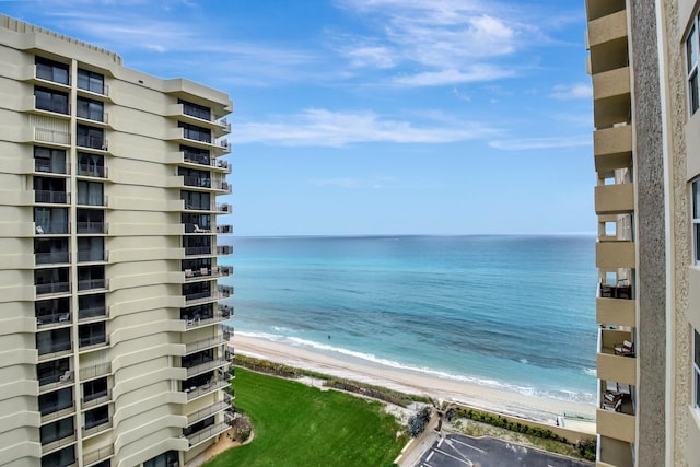 property view of water featuring a beach view