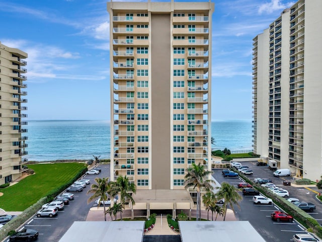 view of building exterior with a water view