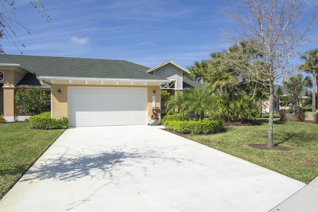 view of front of home with an attached garage, stucco siding, concrete driveway, and a front yard