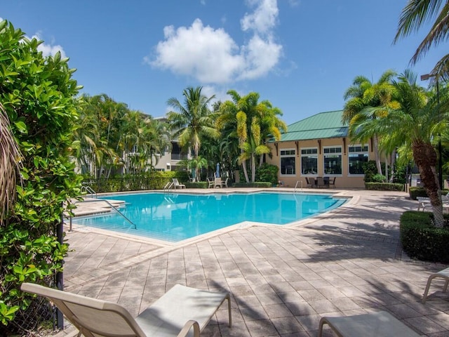 pool with a patio area