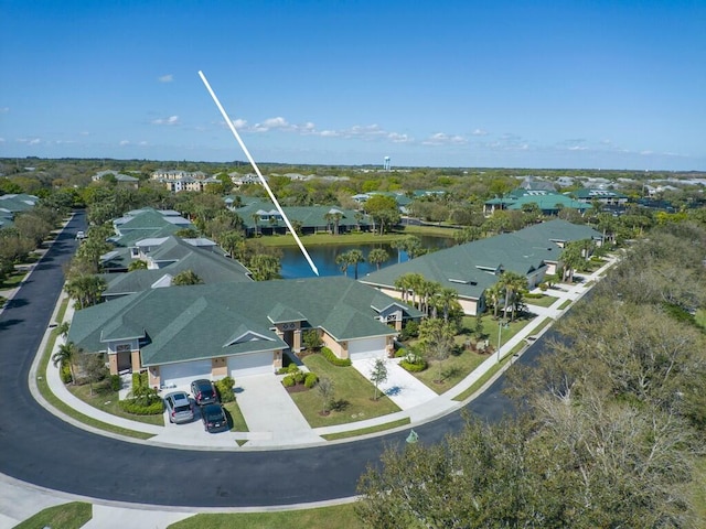 aerial view featuring a residential view and a water view