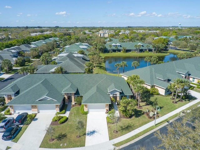 aerial view featuring a residential view and a water view