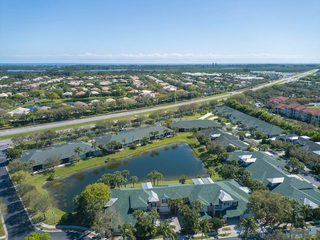 aerial view with a water view and a residential view