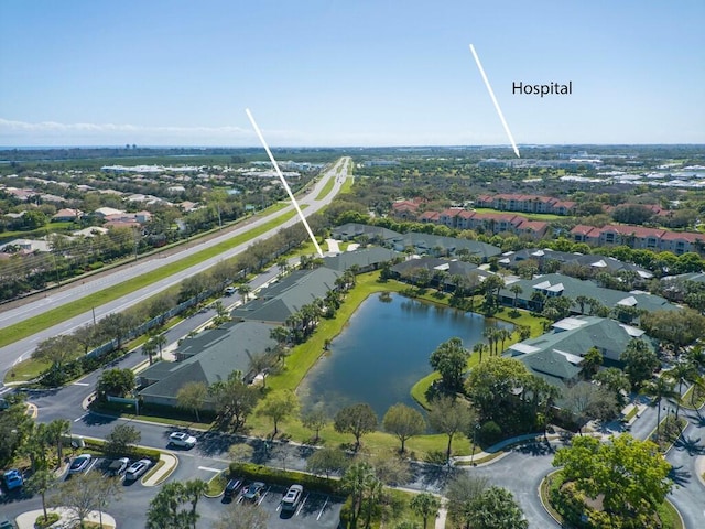 birds eye view of property featuring a water view