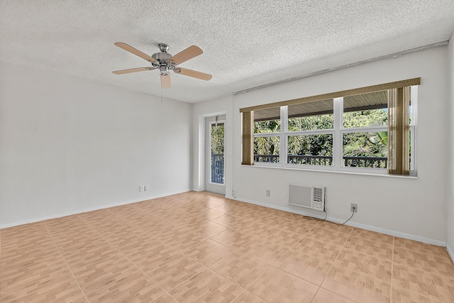 unfurnished room featuring baseboards, a textured ceiling, and a ceiling fan