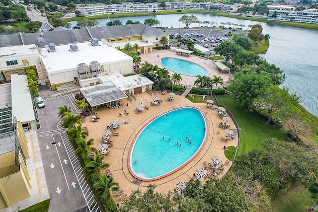 drone / aerial view with a water view