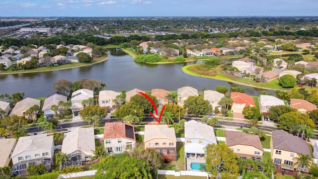 aerial view featuring a water view and a residential view