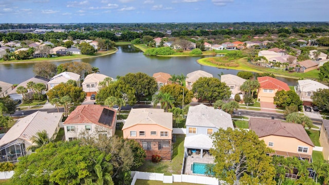 bird's eye view with a water view and a residential view