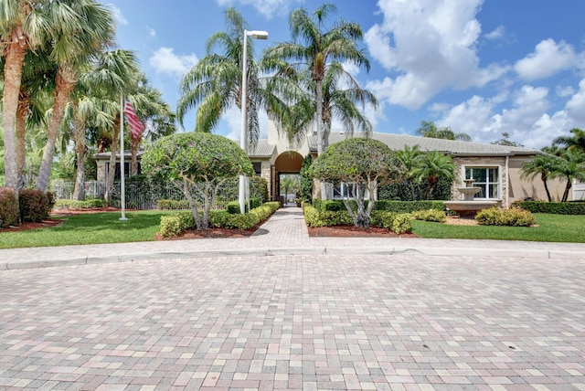 view of front of house featuring stucco siding