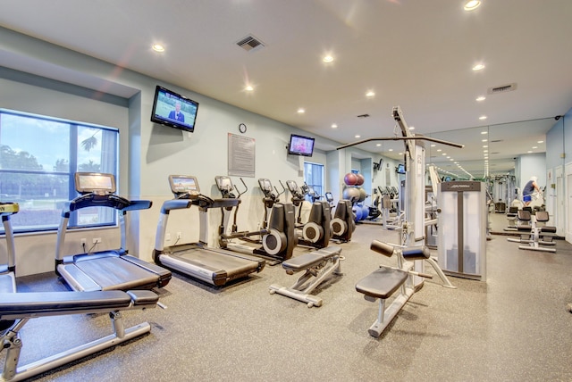 exercise room featuring visible vents and recessed lighting