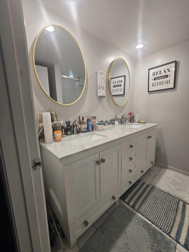 bathroom with vanity and tile patterned floors