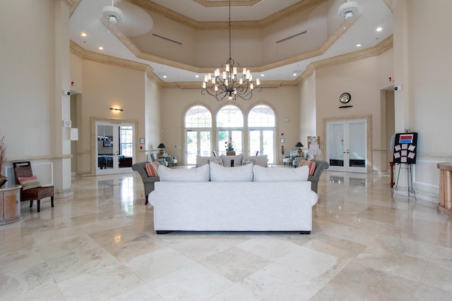 living area featuring marble finish floor, ornamental molding, and french doors