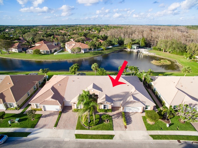 bird's eye view featuring a residential view and a water view