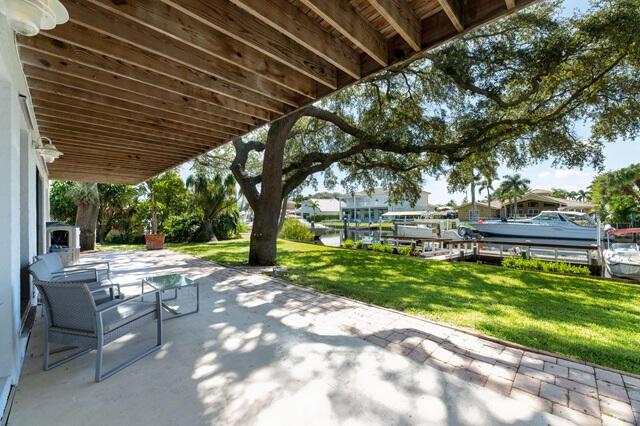 view of patio / terrace with a water view