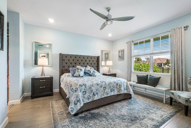 bedroom featuring ceiling fan and light hardwood / wood-style floors