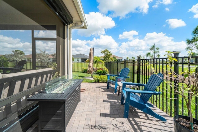 view of patio featuring an outdoor fire pit