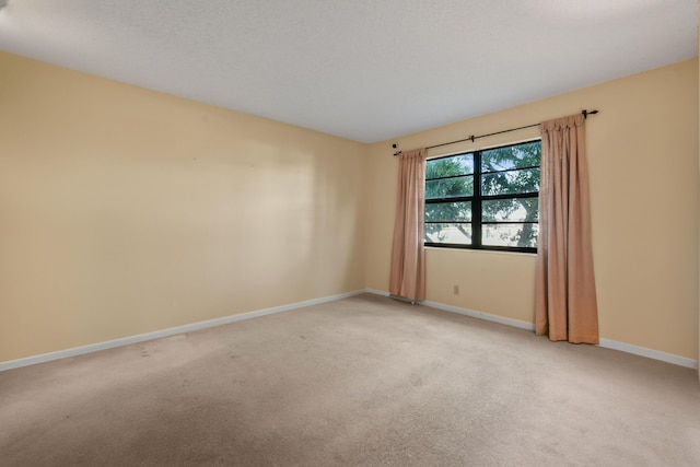 4640 Lucerne Lakes Blvd Unit 306, Lake Worth, FL 33467 - spare room with light carpet and baseboards