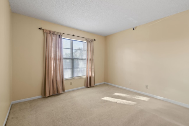 4640 Lucerne Lakes Blvd Unit 306, Lake Worth, FL 33467 - carpeted spare room featuring baseboards and a textured ceiling