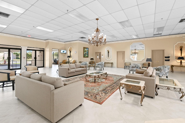 4640 Lucerne Lakes Blvd Unit 306, Lake Worth, FL 33467 - living area with a chandelier, a drop ceiling, and tile patterned flooring