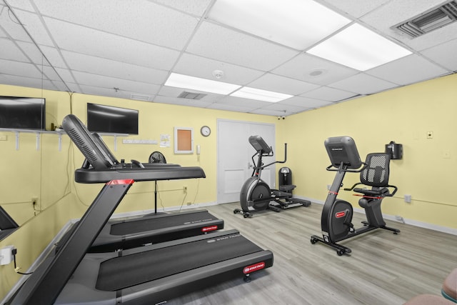 4640 Lucerne Lakes Blvd Unit 306, Lake Worth, FL 33467 - workout room with wood finished floors, baseboards, and a drop ceiling