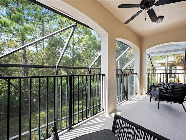 balcony featuring ceiling fan