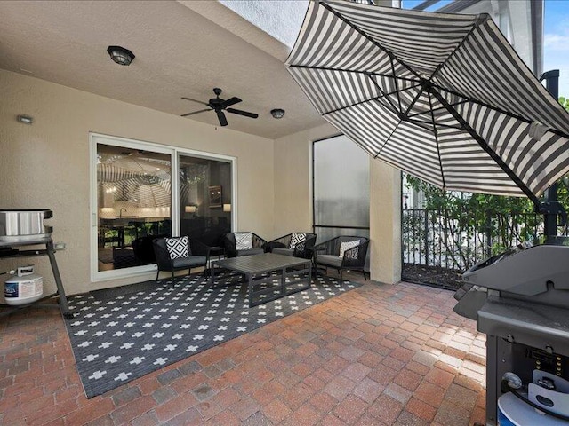 view of patio / terrace featuring ceiling fan and an outdoor hangout area