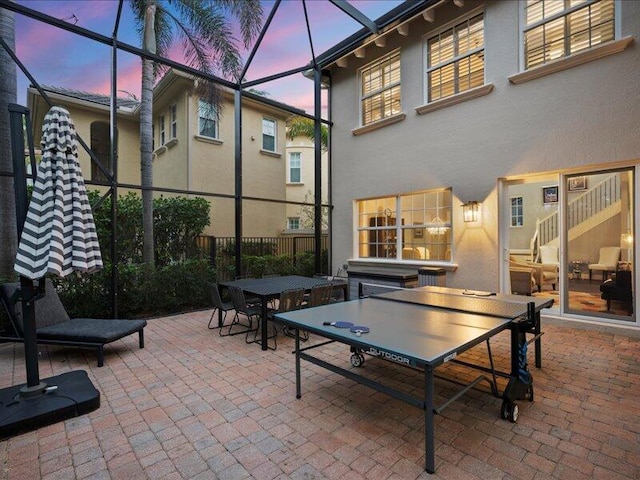 view of patio terrace at dusk