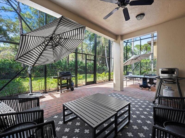 exterior space featuring ceiling fan