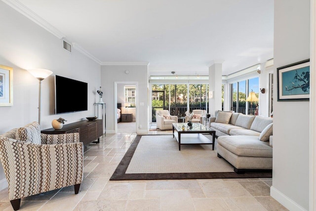 living room featuring crown molding