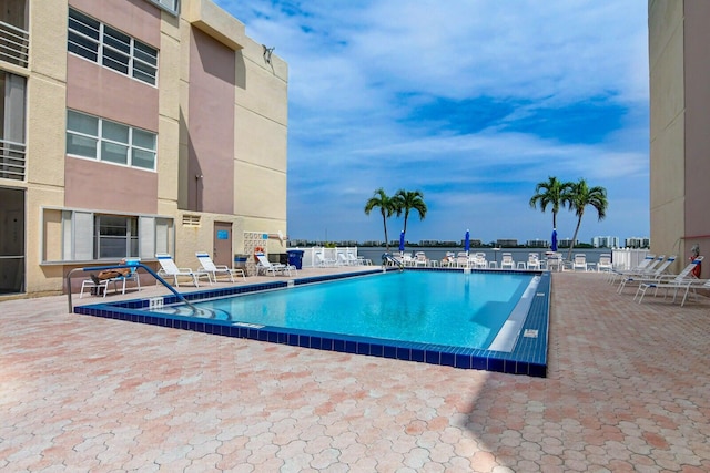 view of pool featuring a patio area